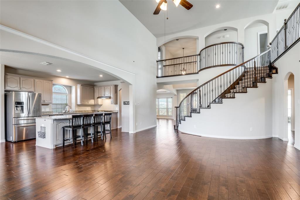 679 Princeton Way Rockwall, TX 75087 - Photo 2 of 25 a view of dining room with furniture and wooden floor