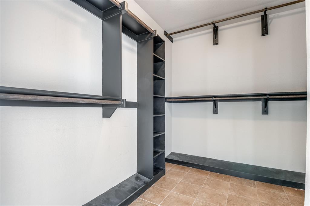 679 Princeton Way Rockwall, TX 75087 - Photo 23 of 25 a view of small space with racks on the wall