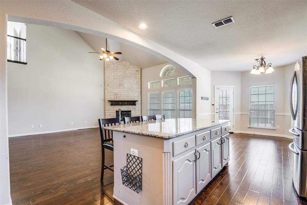 679 Princeton Way Rockwall, TX 75087 - Photo 7 of 25 a kitchen with counter top space and sink