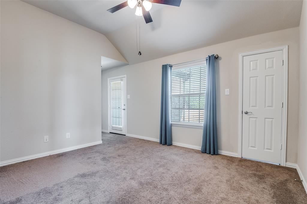 679 Princeton Way Rockwall, TX 75087 - Photo 10 of 25 a view of an empty room with a window