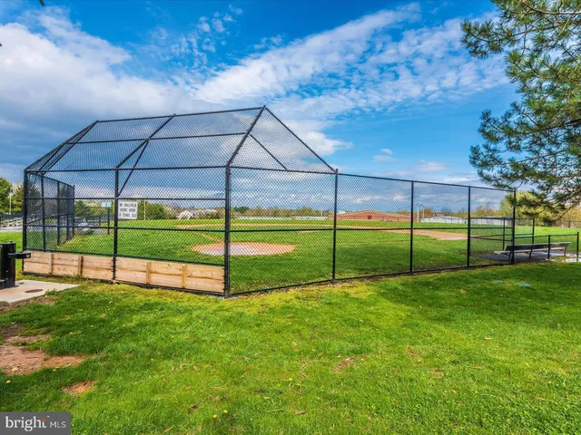 a view of a backyard with a garden