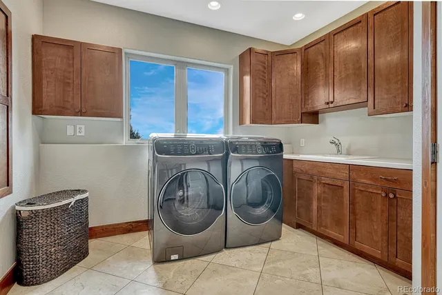 a kitchen with a cabinets and a sink