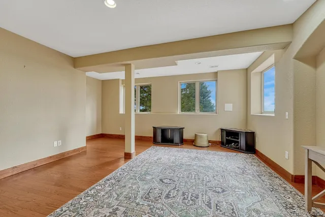 a view of livingroom with furniture and windows