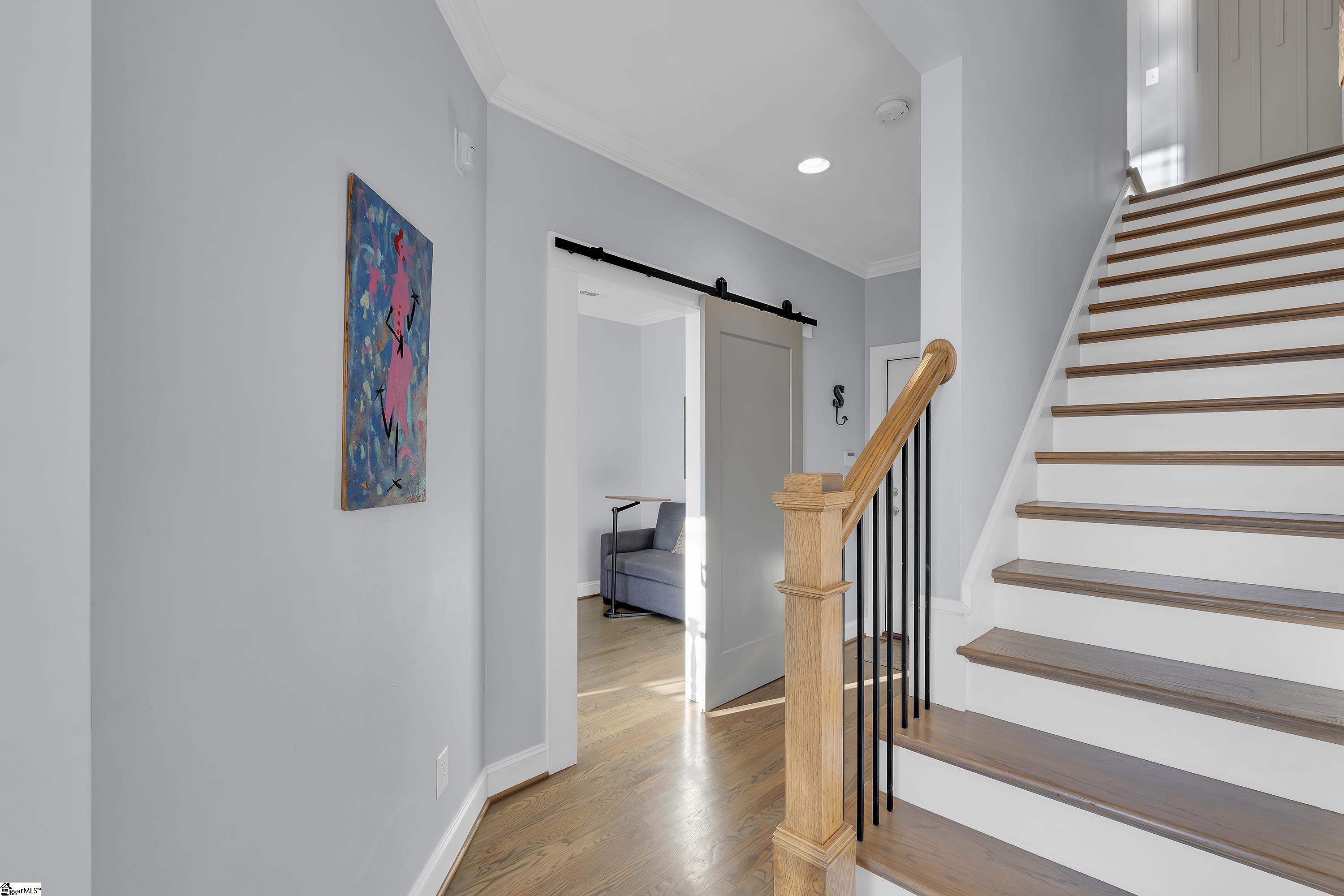 214 Gibbs Street Greenville, SC 29601 - Photo 9 of 45 Leading to front porch, flex room and garage with under stairs storage