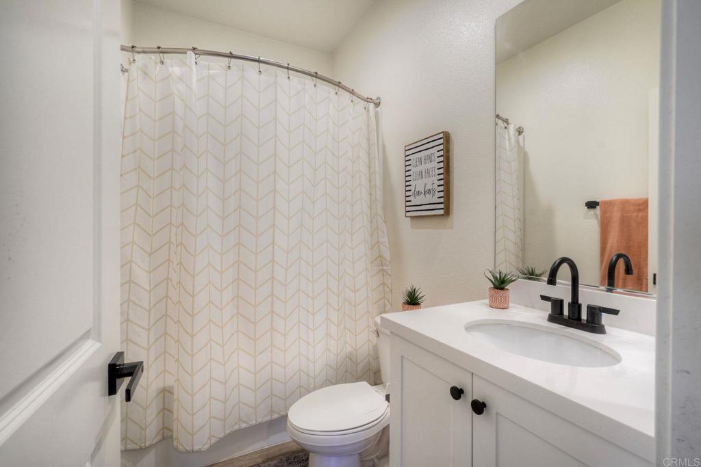 4141 Mission Tree Way Oceanside, CA 92057 - Photo 23 of 29 Upstairs Hall Full Bath