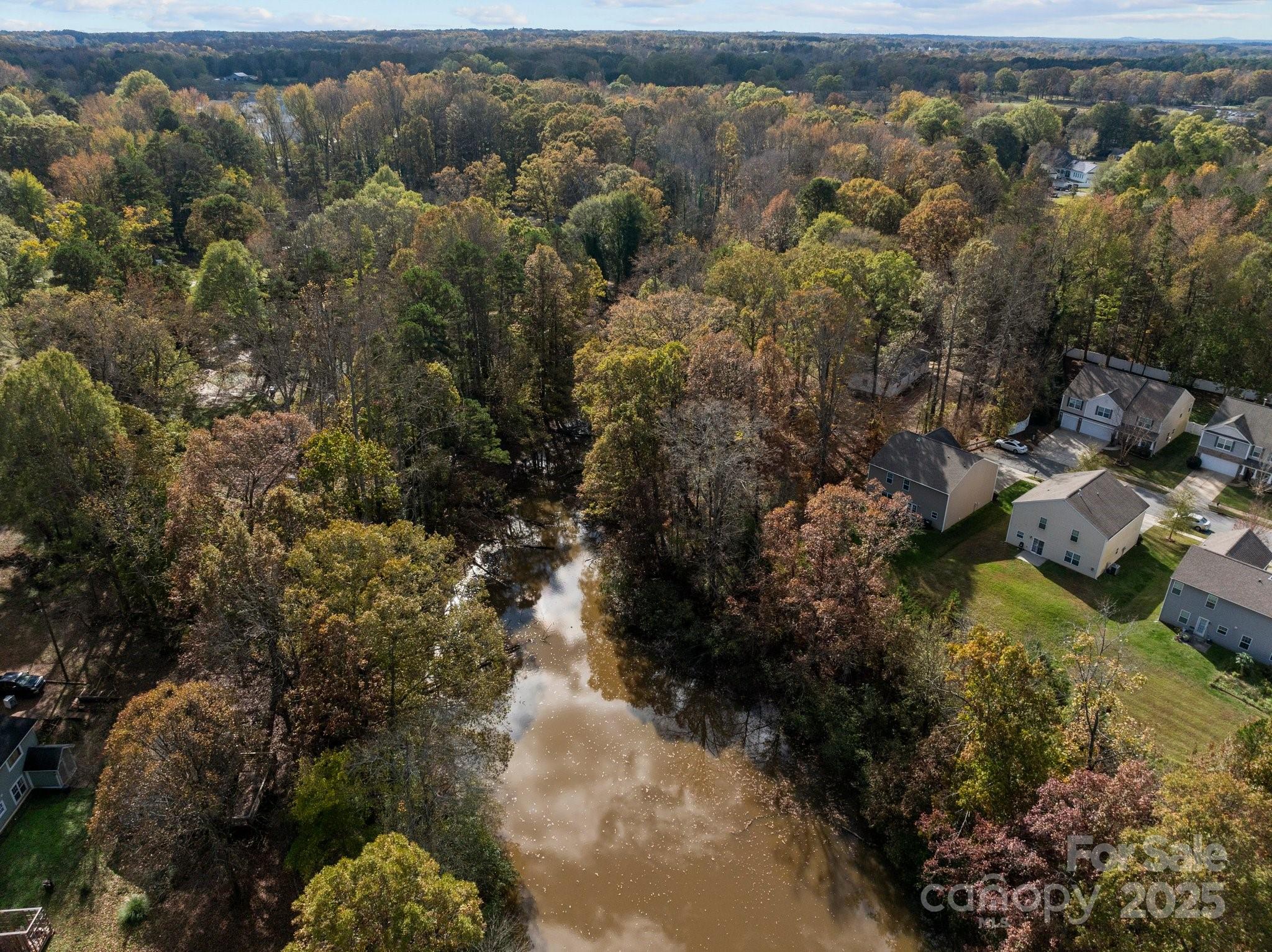 4642 McClure Road Charlotte, NC 28216 - Photo 13 of 48 a view of a houses with a yard
