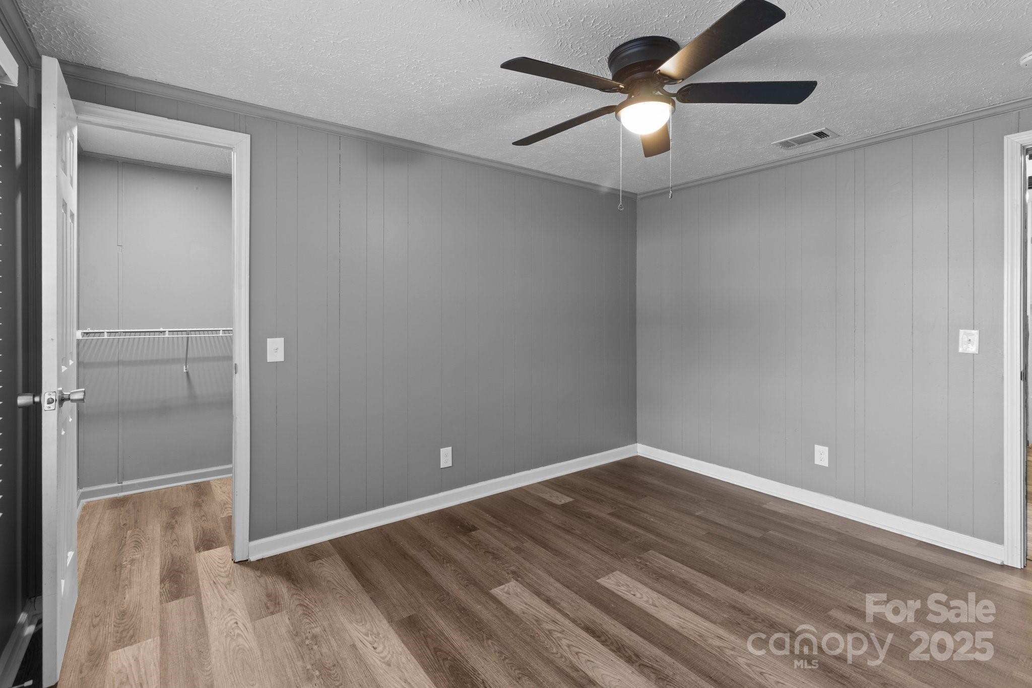 4642 McClure Road Charlotte, NC 28216 - Photo 31 of 48 wooden floor in an empty room