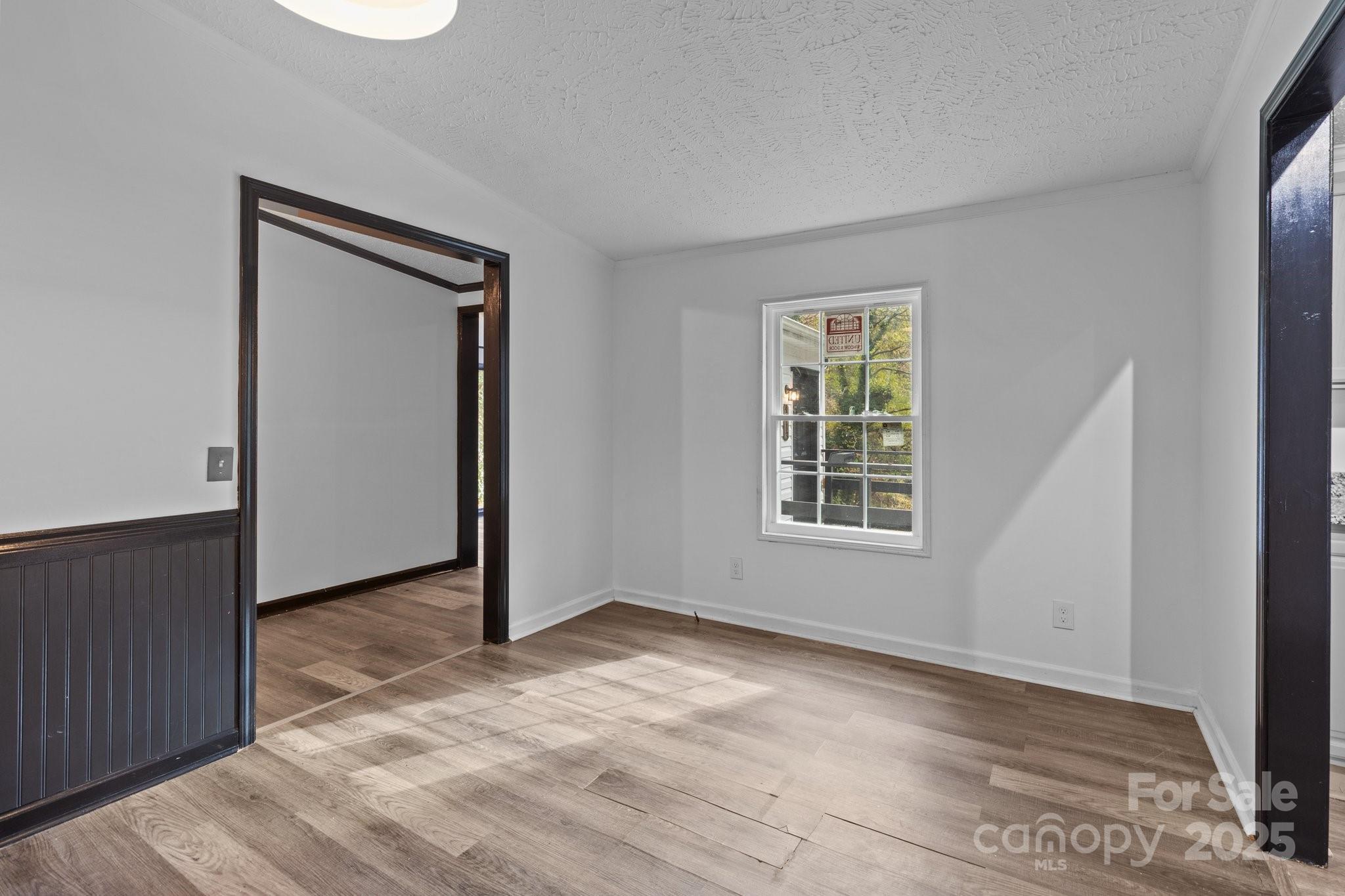 4642 McClure Road Charlotte, NC 28216 - Photo 44 of 48 an empty room with windows and closet