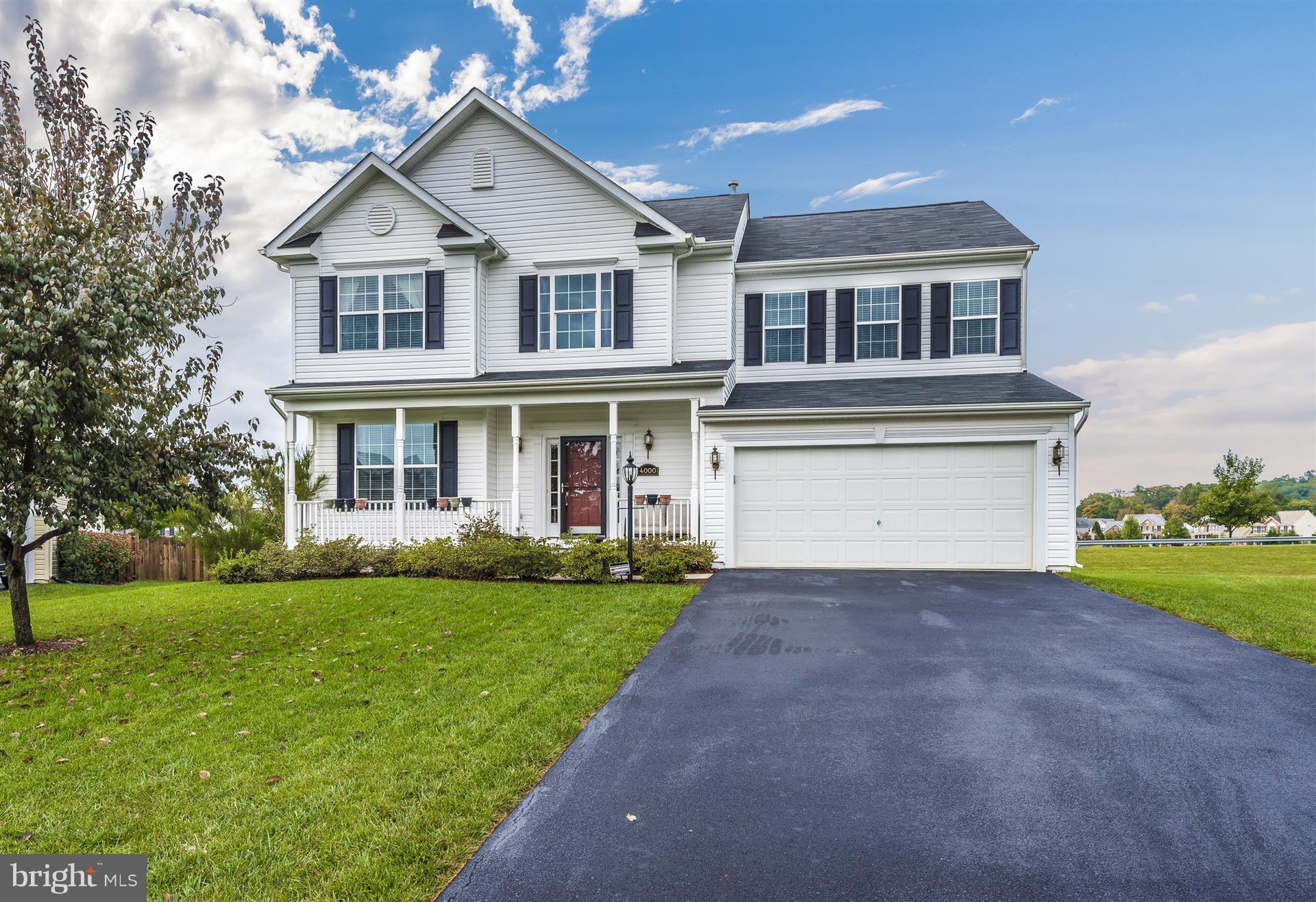 4000 Paw Paw Circle Point of Rocks, MD 21777 - Photo 1 of 30 a front view of a house with a yard and garage