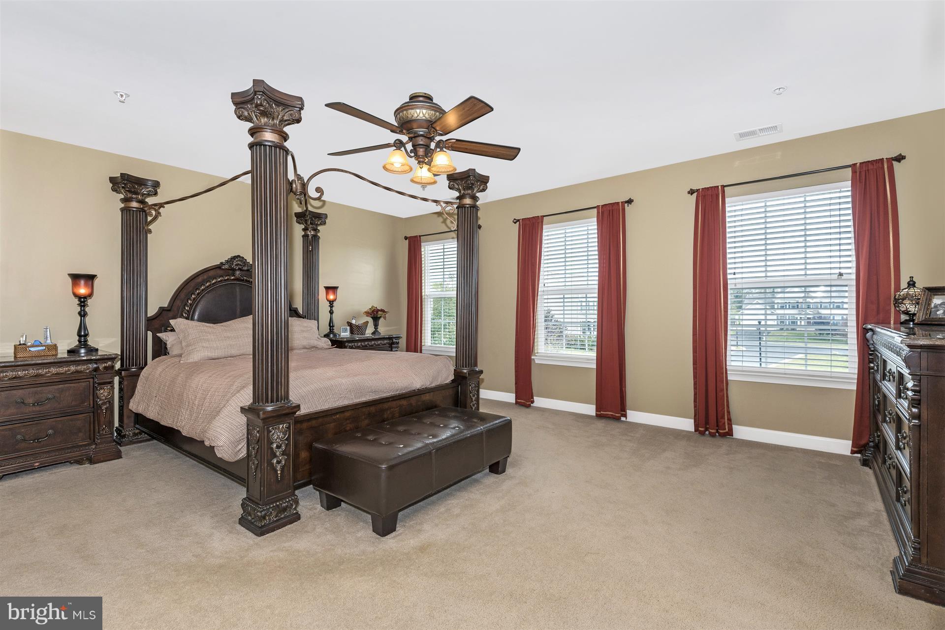 4000 Paw Paw Circle Point of Rocks, MD 21777 - Photo 20 of 30 a spacious bedroom with a bed couch and window