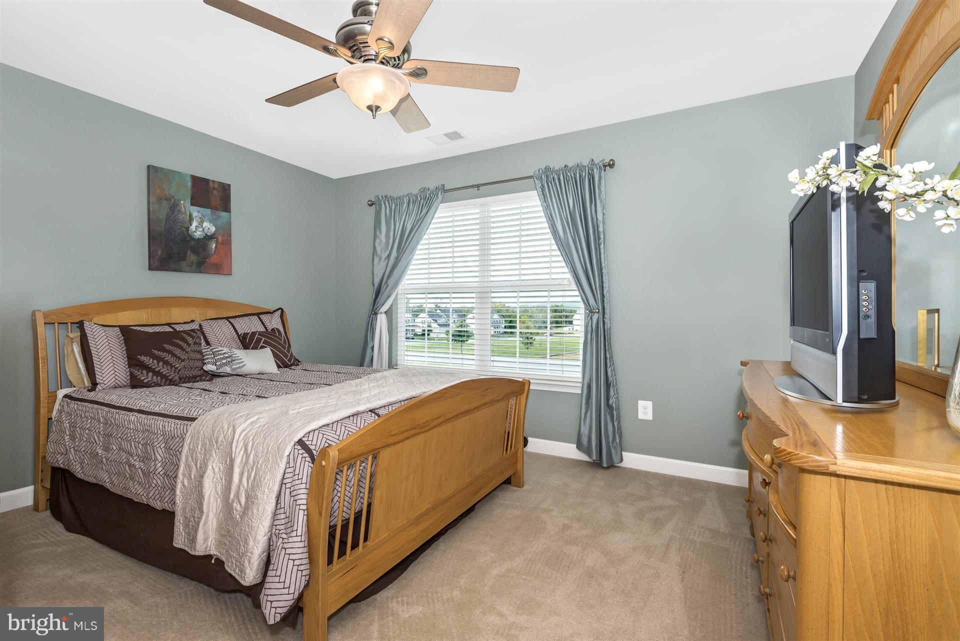 4000 Paw Paw Circle Point of Rocks, MD 21777 - Photo 23 of 30 a bedroom with a bed dresser and a window