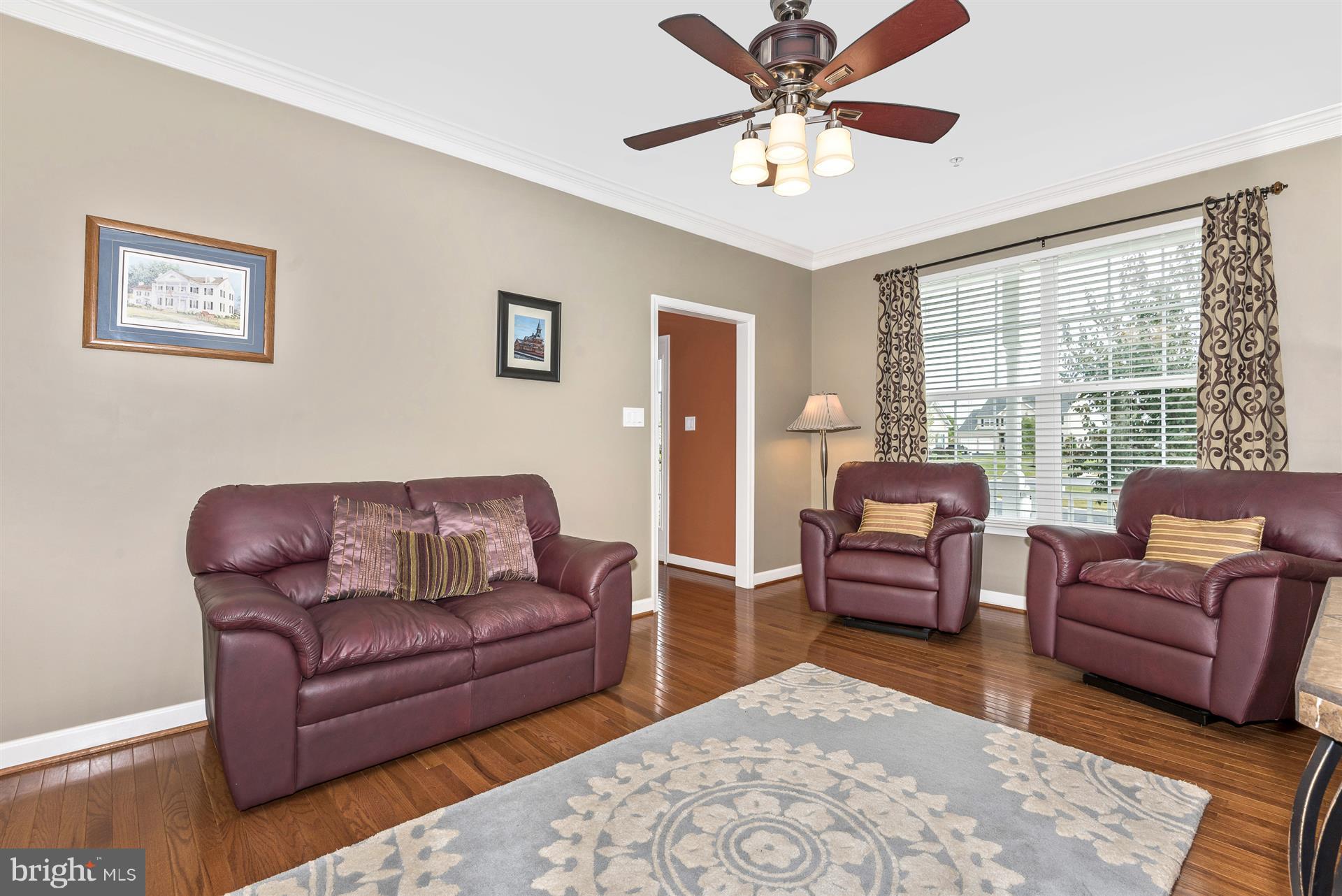 4000 Paw Paw Circle Point of Rocks, MD 21777 - Photo 6 of 30 a living room with furniture ceiling fan and a window