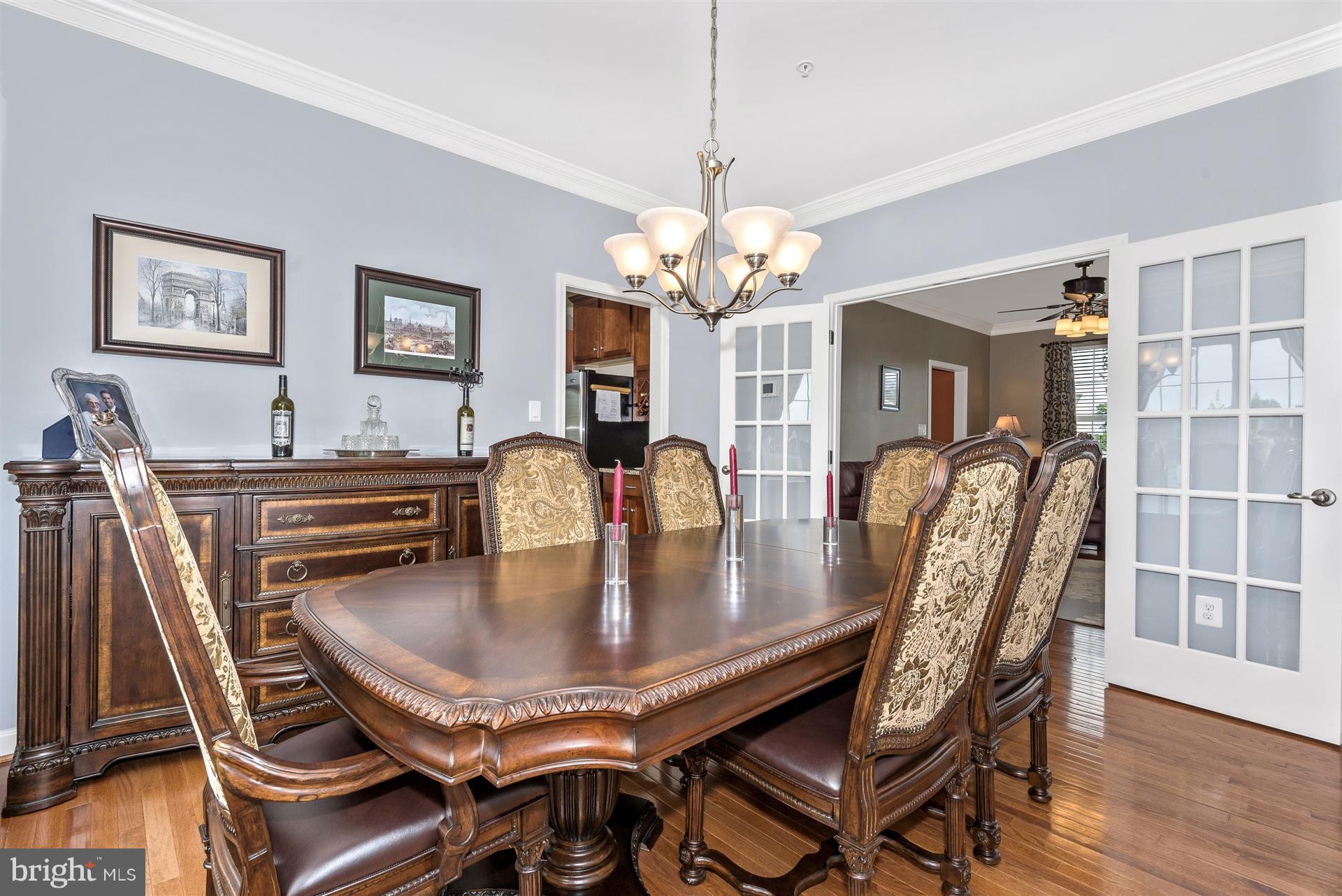 4000 Paw Paw Circle Point of Rocks, MD 21777 - Photo 9 of 30 a dining room with furniture a chandelier and wooden floor