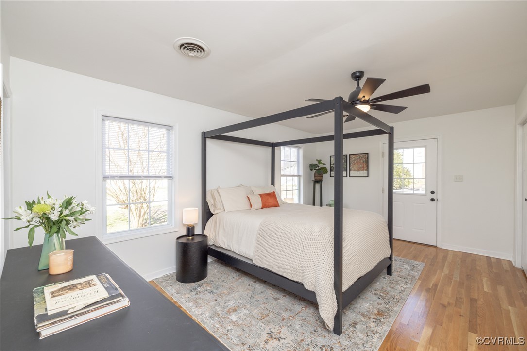 3057 West River Road Goochland, VA 23063 - Photo 16 of 35 Primary bedroom with a ceiling fan, wood finished