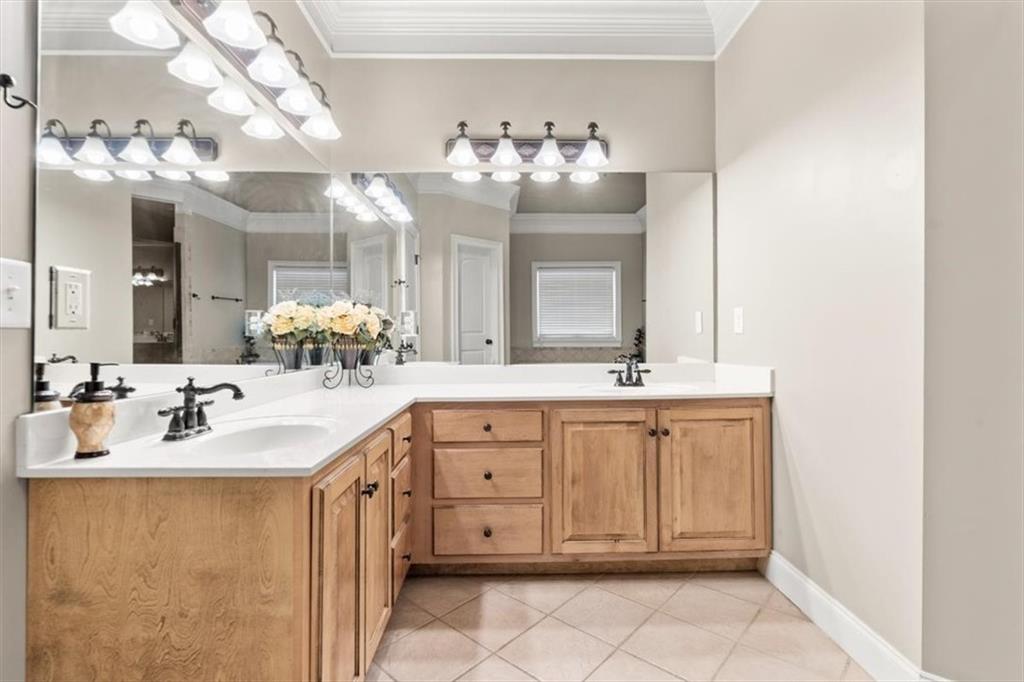 18 Nelson Boulevard Northwest Rome, GA 30165 - Photo 18 of 41 a bathroom with a sink vanity and a mirror
