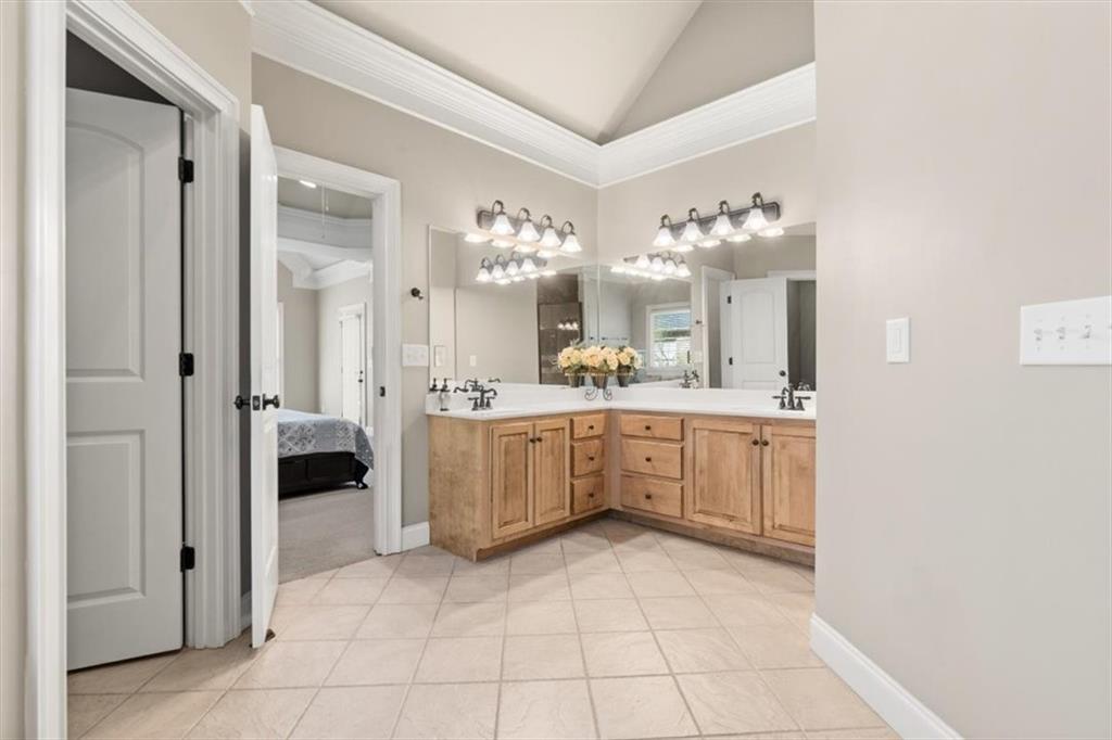 18 Nelson Boulevard Northwest Rome, GA 30165 - Photo 19 of 41 a large white room with a large mirror and cabinets