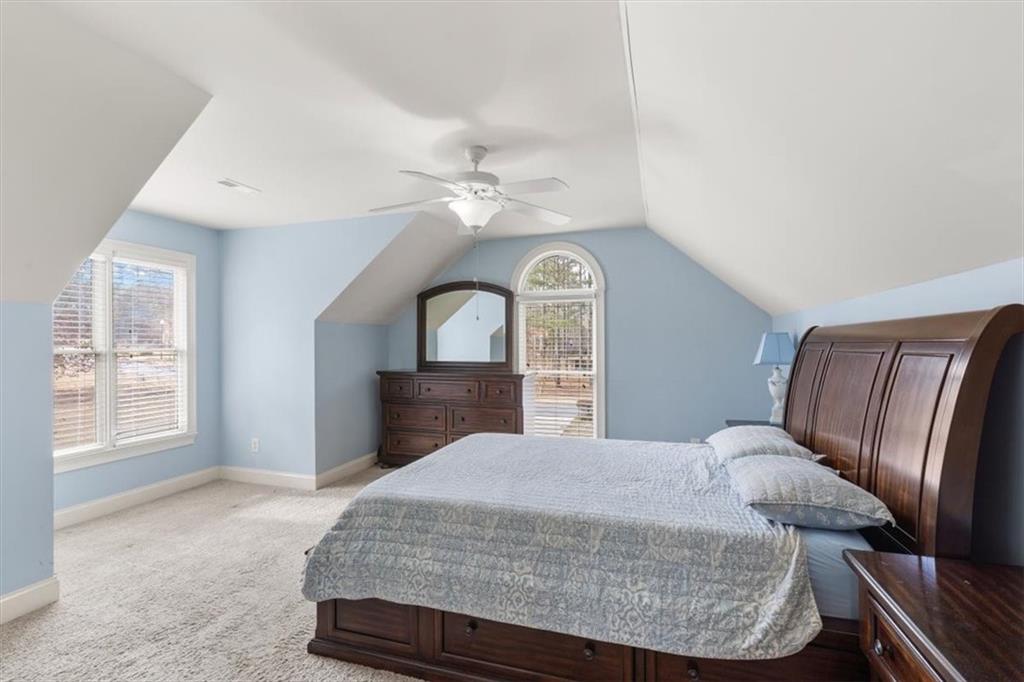 18 Nelson Boulevard Northwest Rome, GA 30165 - Photo 24 of 41 a living room with a bed furniture and a window