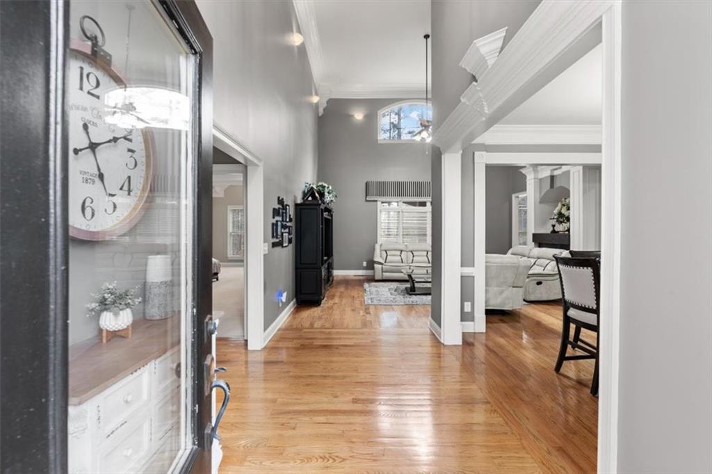 18 Nelson Boulevard Northwest Rome, GA 30165 - Photo 3 of 41 a living room with furniture and a chandelier