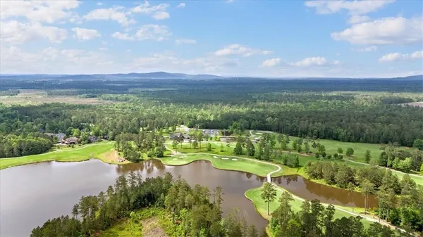 a view of a lake with a city