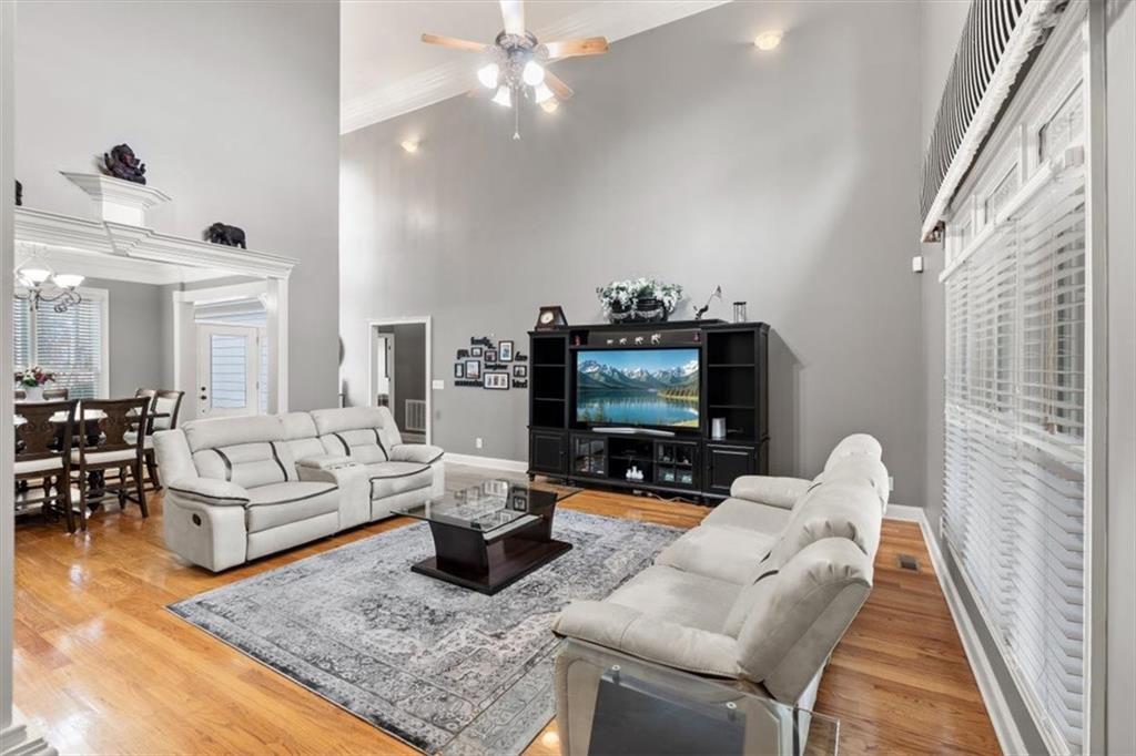18 Nelson Boulevard Northwest Rome, GA 30165 - Photo 6 of 41 a living room with furniture and a flat screen tv