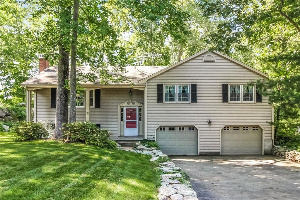 Beautiful 3-4 Bedroom, 2 Full Bath home nestled on 1.09 Acres a short distance to Historic Downtown Mystic. Meticulously maintained.