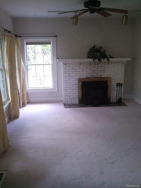 1449 Roods Lake Road Lapeer, MI 48446 - Photo 9 of 16 Living Room Fireplace.jpg
