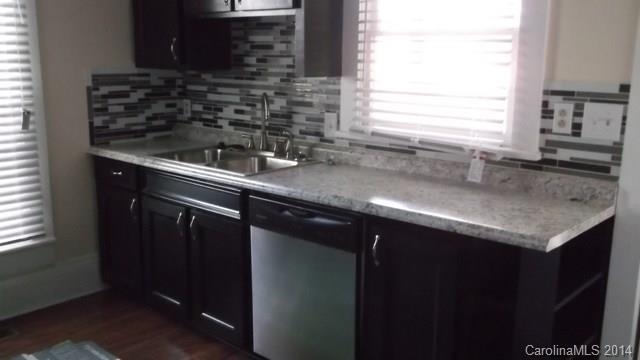 8500 Old Concord Road Charlotte, NC 28213 - Photo 2 of 15 a kitchen with a sink and cabinets