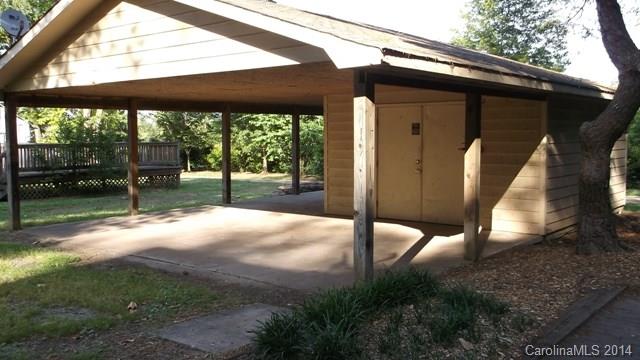 8500 Old Concord Road Charlotte, NC 28213 - Photo 14 of 15 a backyard of a house with table and chairs