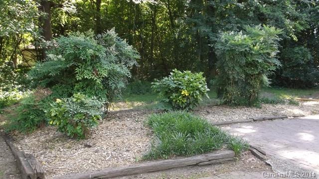8500 Old Concord Road Charlotte, NC 28213 - Photo 15 of 15 a view of a garden with plants and large trees