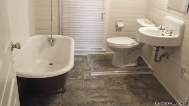 8500 Old Concord Road Charlotte, NC 28213 - Photo 10 of 15 a bathroom with a sink toilet and a mirror