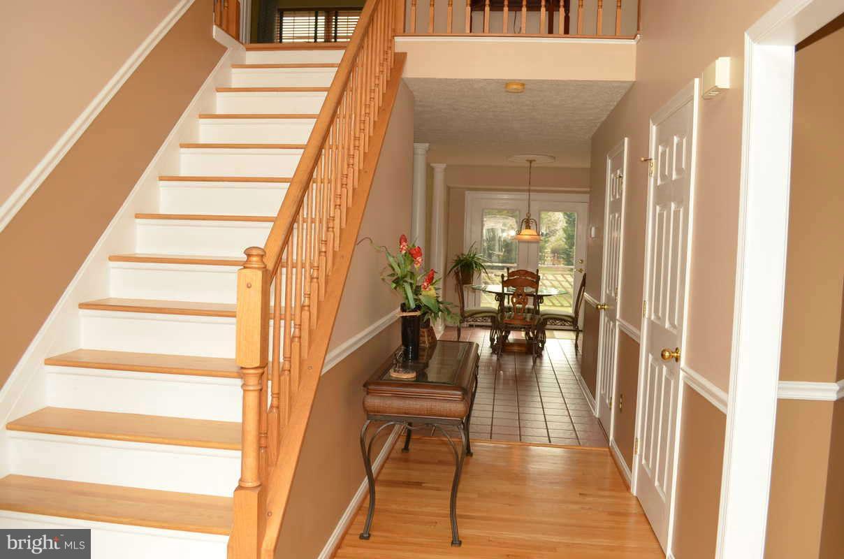 1465 Old Hickory Road Annapolis, MD 21409 - Photo 3 of 30 a view of entryway and hall with wooden floor