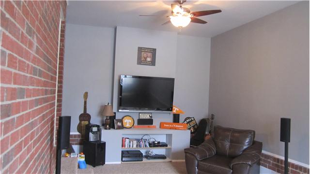 607 Terrace Hill Road Mount Juliet, TN 37122 - Photo 17 of 20 Built in Media Center in Rec Room offers space for everything you need to set up the TV equipment. Exposed brick wall adds character.
