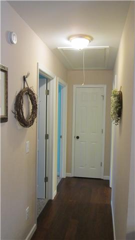 607 Terrace Hill Road Mount Juliet, TN 37122 - Photo 18 of 20 Engineered wood flooring extends down hall to the 2nd & 3rd BR's & Hall Bath.