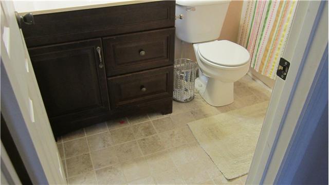 607 Terrace Hill Road Mount Juliet, TN 37122 - Photo 19 of 20 Hall bath has tile flooring & cabinet sink.