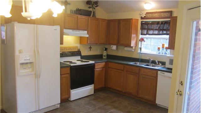 607 Terrace Hill Road Mount Juliet, TN 37122 - Photo 6 of 20 Lots of cabinets. All appliances remain. Tile flooring too - no vinyl in this home.