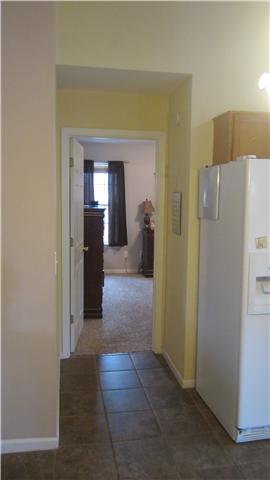 607 Terrace Hill Road Mount Juliet, TN 37122 - Photo 9 of 20 Hallway from Kitchen leads to the Master Bedroom located on other side of the home from the kid's rooms for privacy.