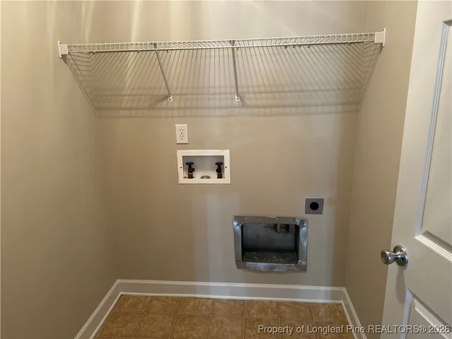 a bathroom with a sink and vanity