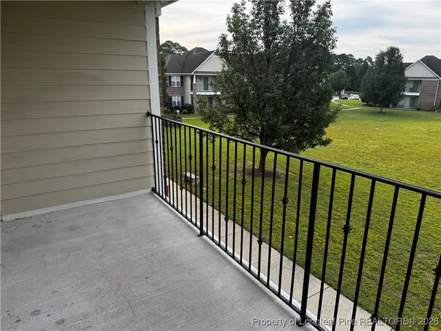 a view of a street from a balcony