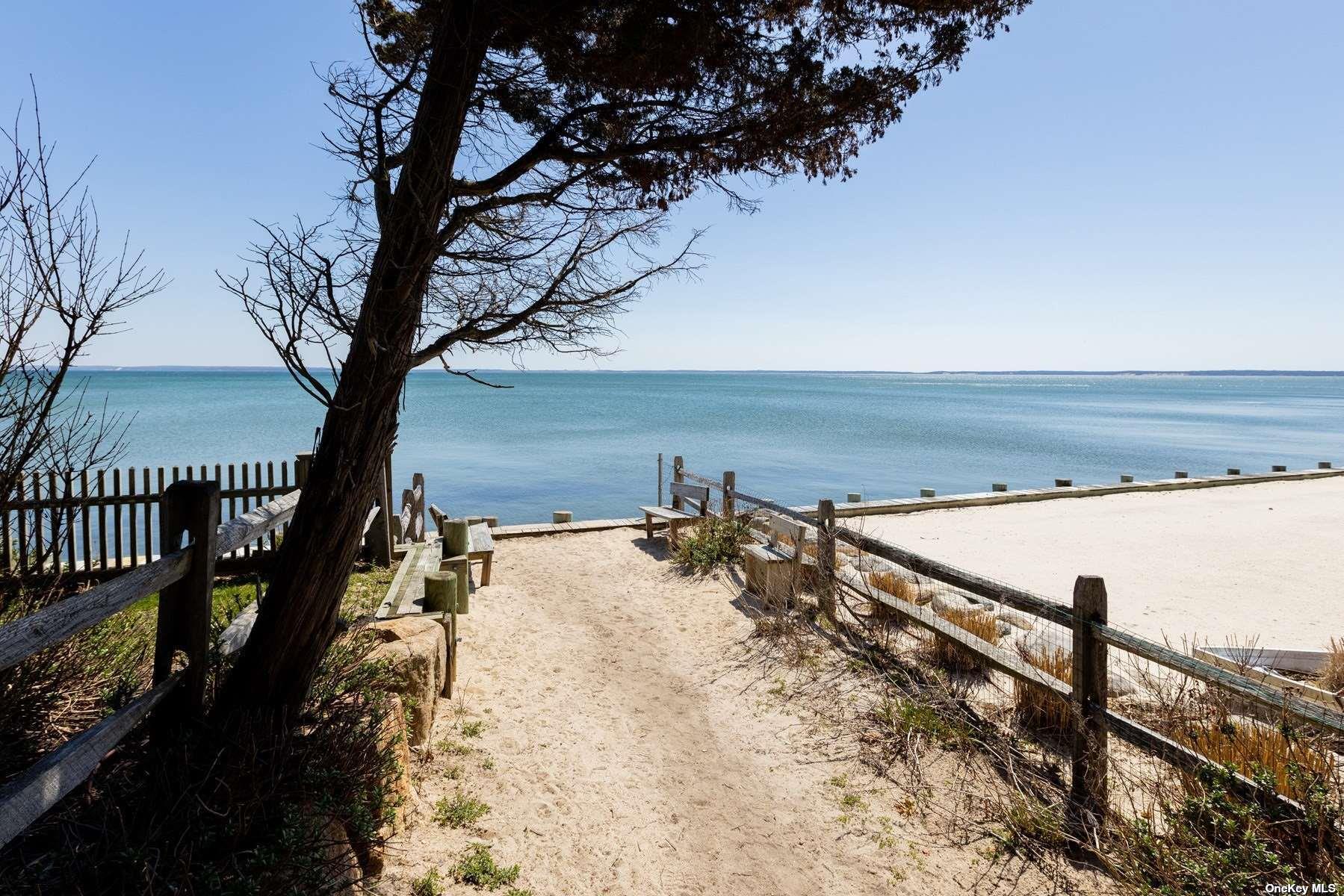 400 Wells Road Laurel, NY 11948 - Photo 14 of 17 a view of a dry yard with wooden fence