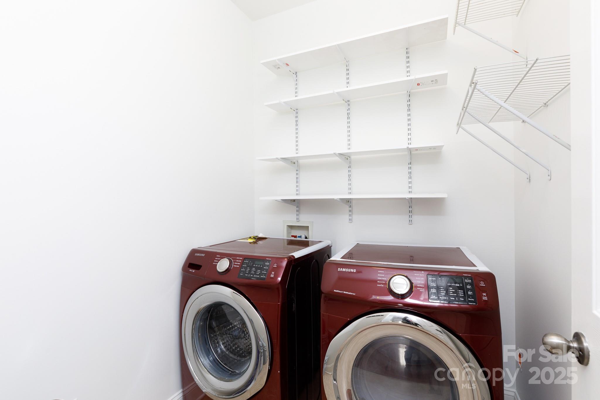 780 Ivy Trail Way Fort Mill, SC 29715 - Photo 13 of 14 a utility room with dryer and washer