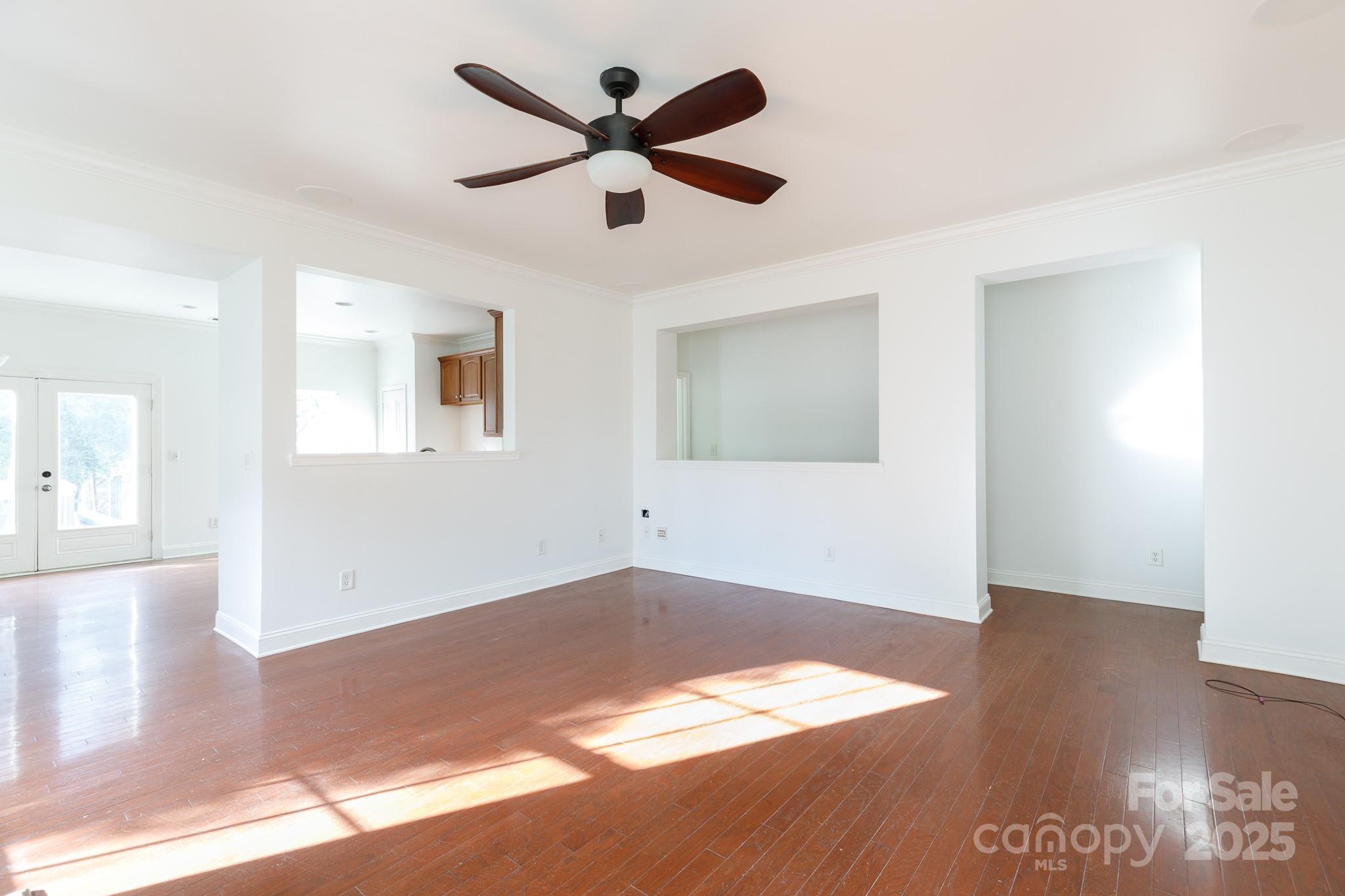 780 Ivy Trail Way Fort Mill, SC 29715 - Photo 3 of 14 a view of empty room with wooden floor