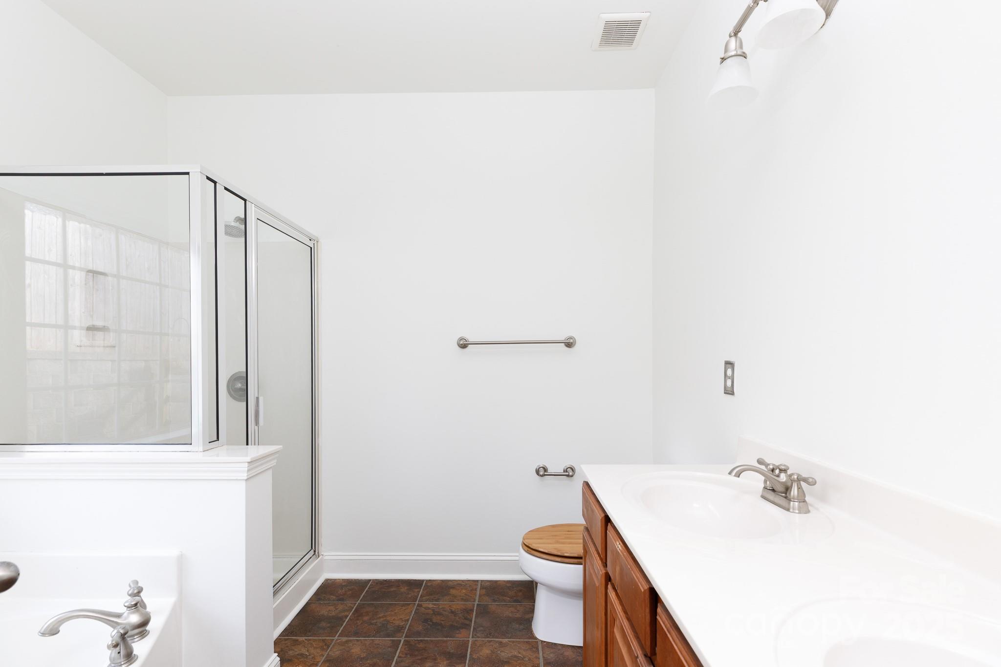 780 Ivy Trail Way Fort Mill, SC 29715 - Photo 8 of 14 a bathroom with a sink and a mirror