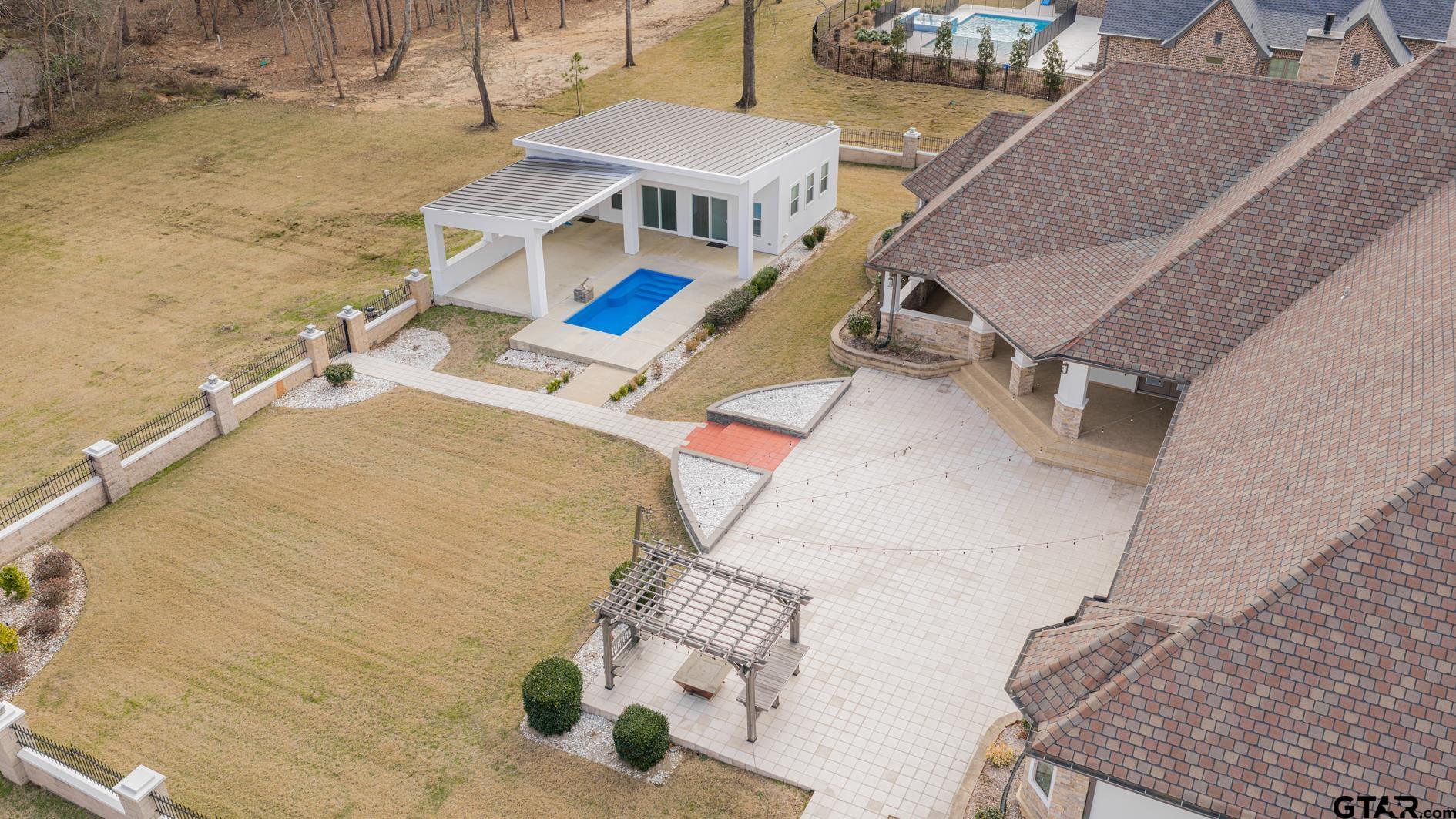 8 Stonebridge Court Longview, TX 75605 - Photo 47 of 48 an aerial view of a house with a ocean view