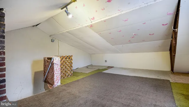 a view of a garage with stairs