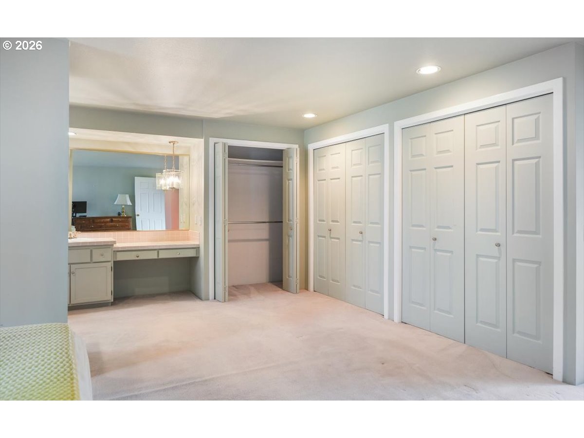 1376 Brickley Road Eugene, OR 97401 - Photo 34 of 48 a bathroom with a sink a mirror and a bathtub