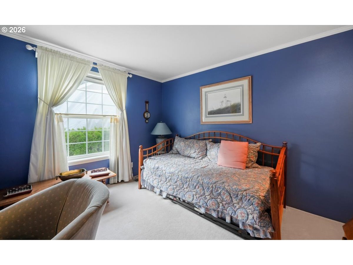 1376 Brickley Road Eugene, OR 97401 - Photo 40 of 48 a bedroom with a bed and a window