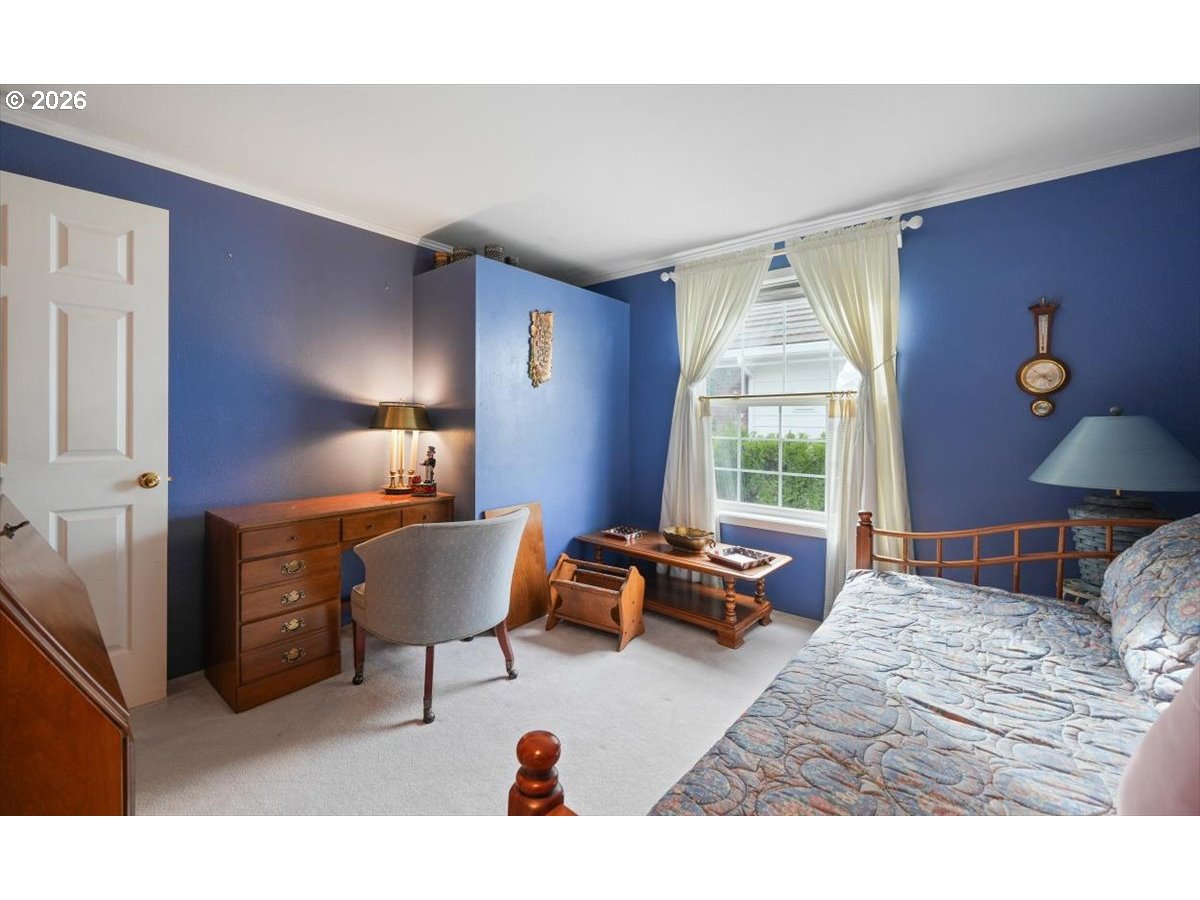 1376 Brickley Road Eugene, OR 97401 - Photo 41 of 48 a bedroom with a bed and wooden floor