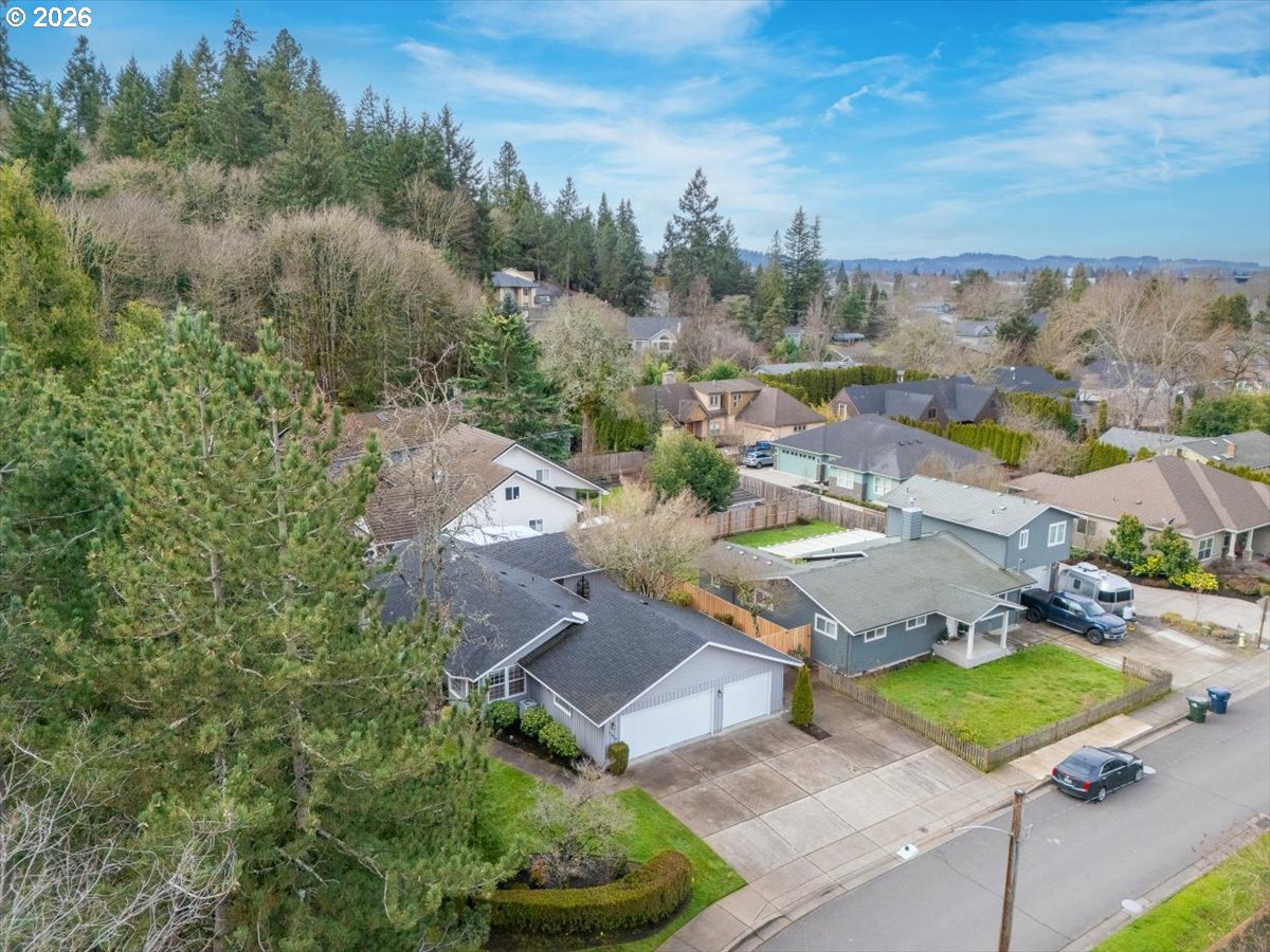 1376 Brickley Road Eugene, OR 97401 - Photo 7 of 48 an aerial view of a house with a yard and lake view