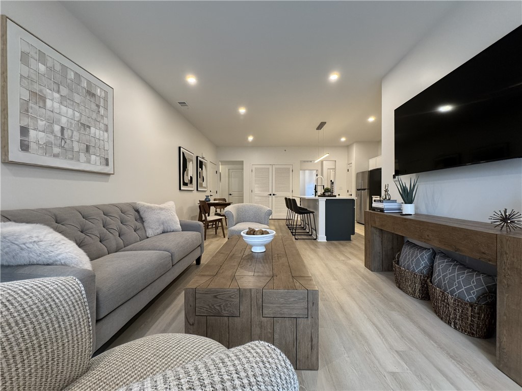 601 Erie Rdg Drive Henrietta, NY 14467 - Photo 2 of 12 Typical great room view including living space, di