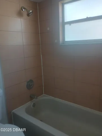 a bathroom with a bathtub